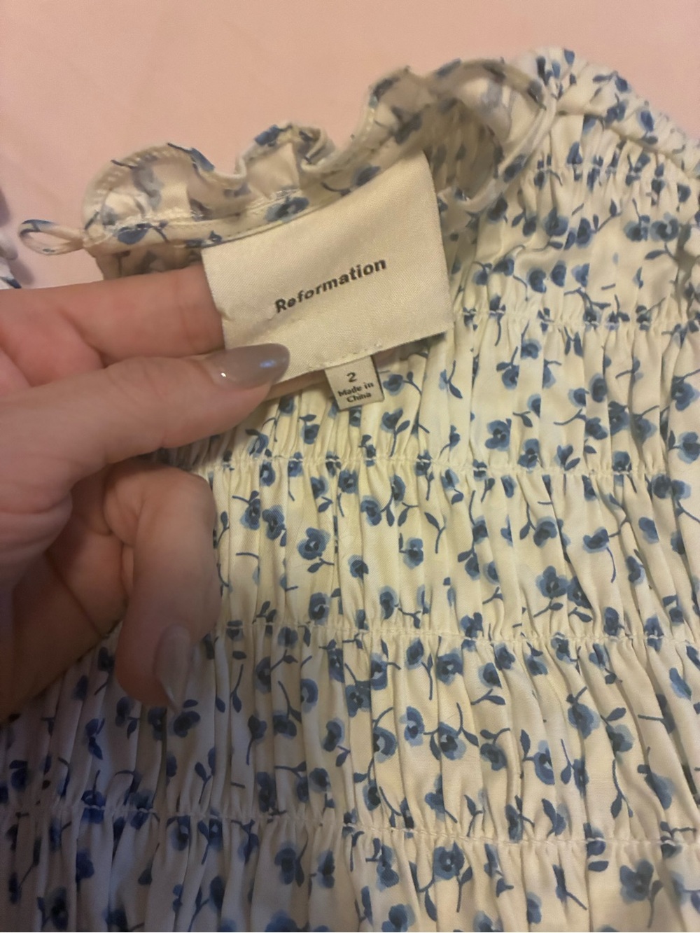Reformation Cream Smocked Blouse with Blue Floral Motif